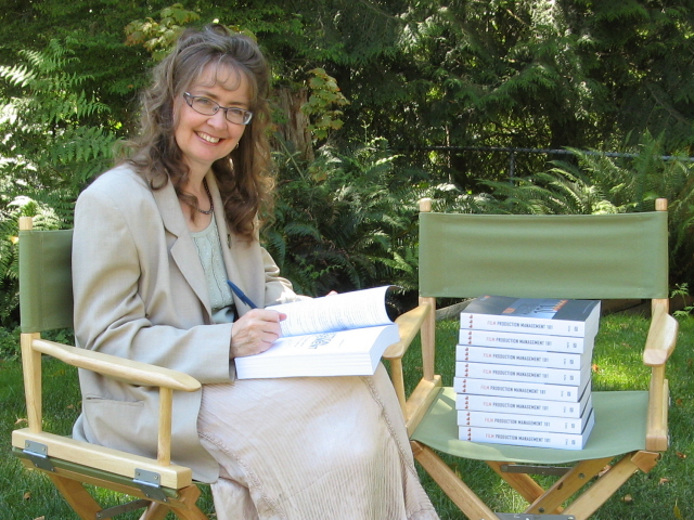 Deb signing books