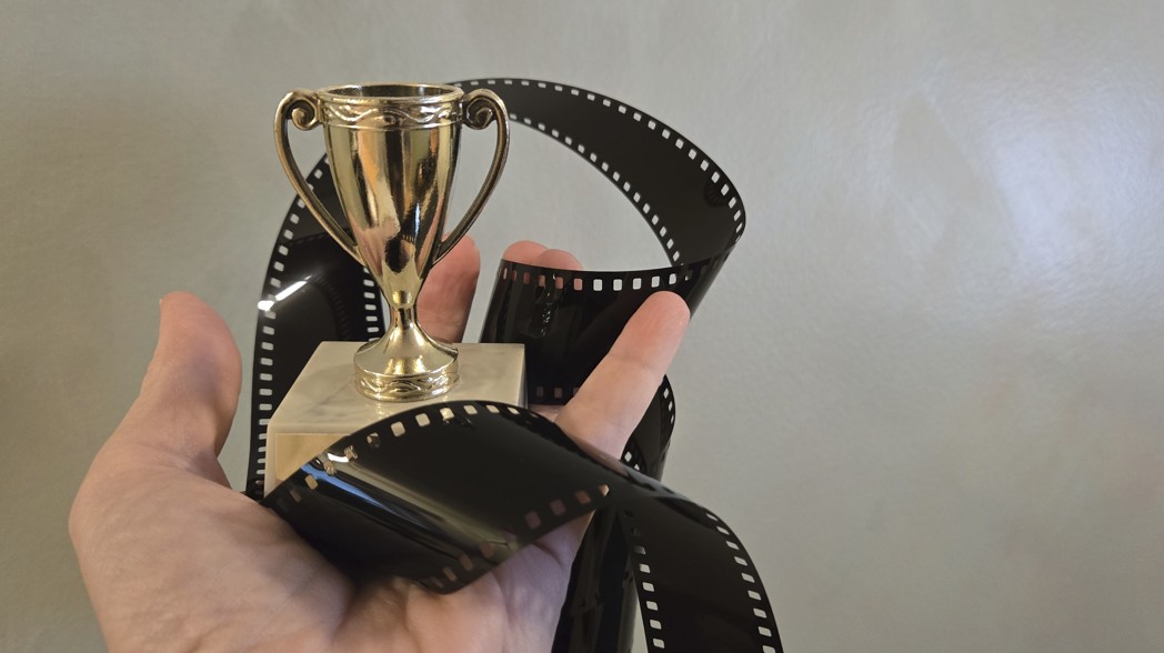 Hand holding an award